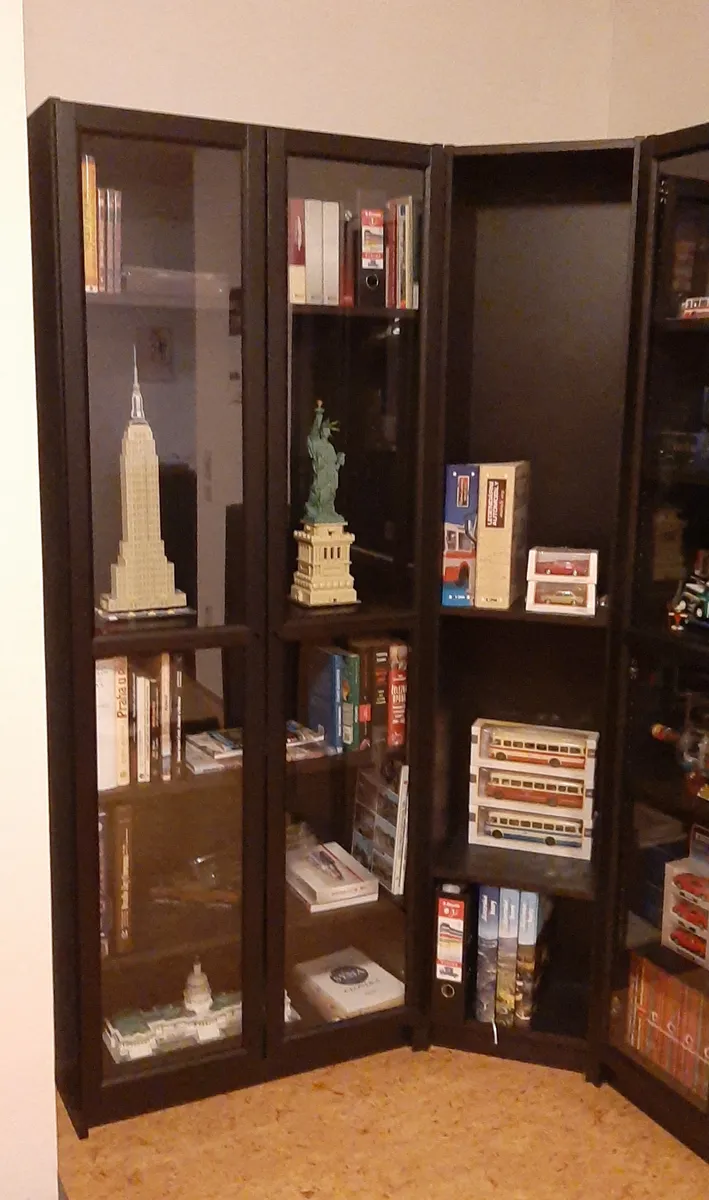 Row of IKEA Billy bookcases lining a wall