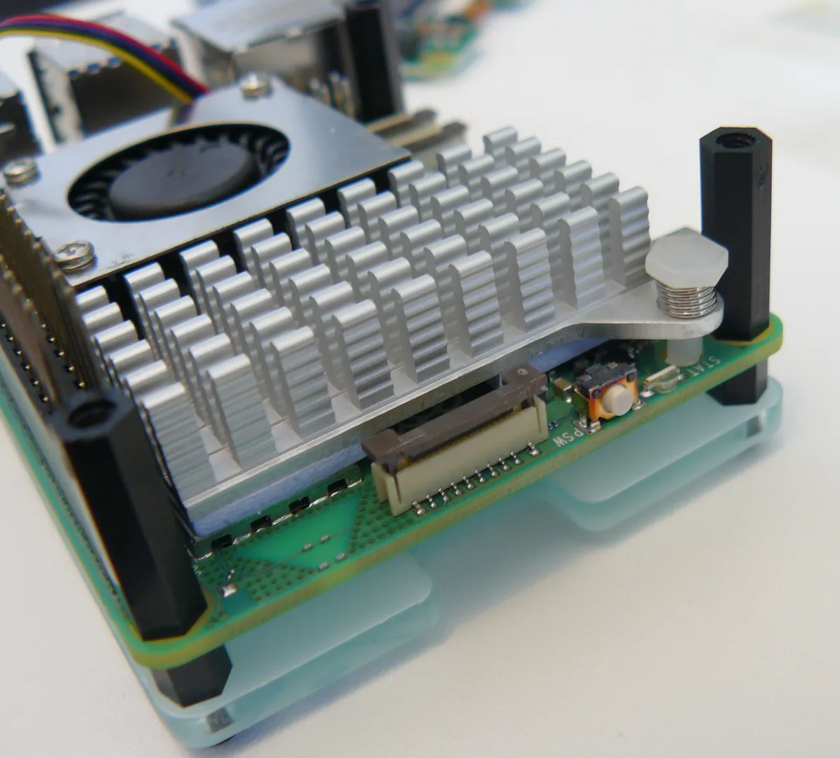 Raspberry Pi 5 with active cooler installed alongside the PCIe connector