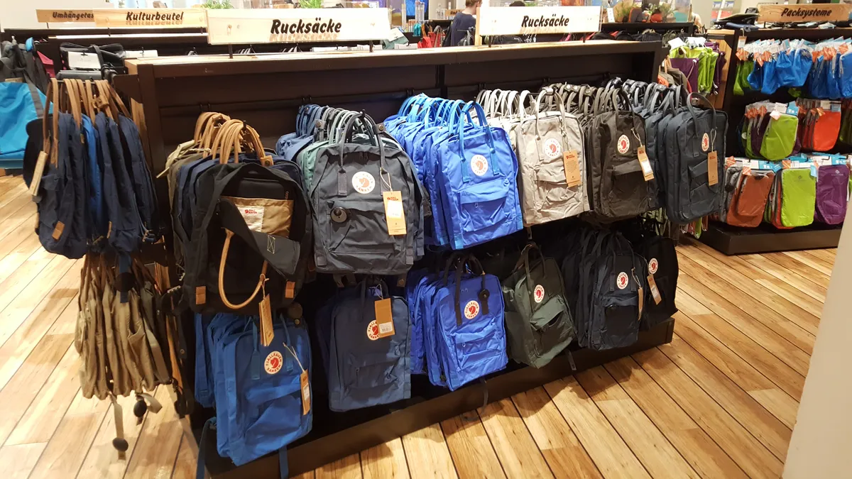 Fjällräven backpacks displayed for sale in a shop