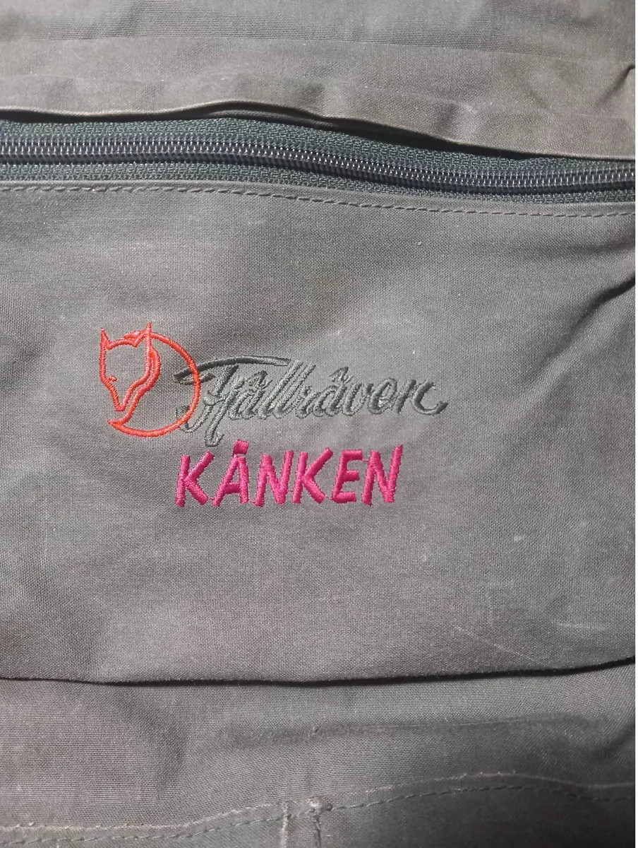 Fjällräven logo patch on a vintage Kånken backpack pocket