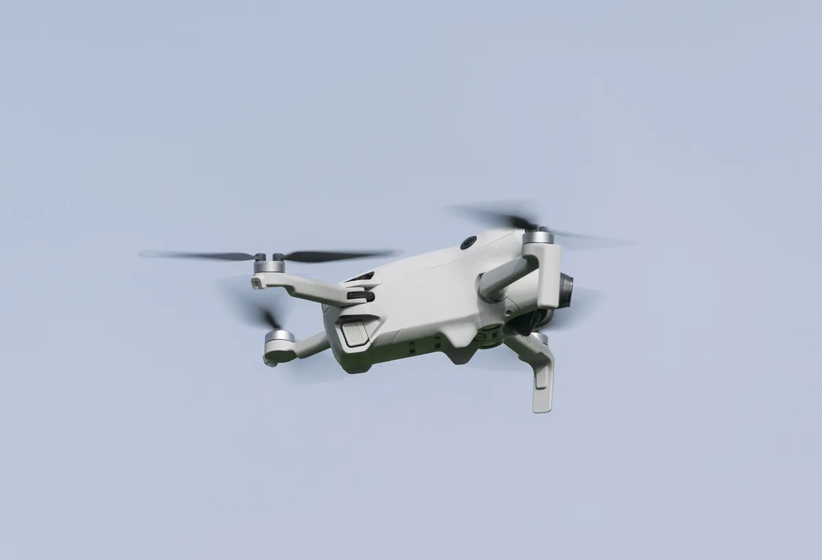 DJI Mini 4 Pro with propellers unfolded ready for flight