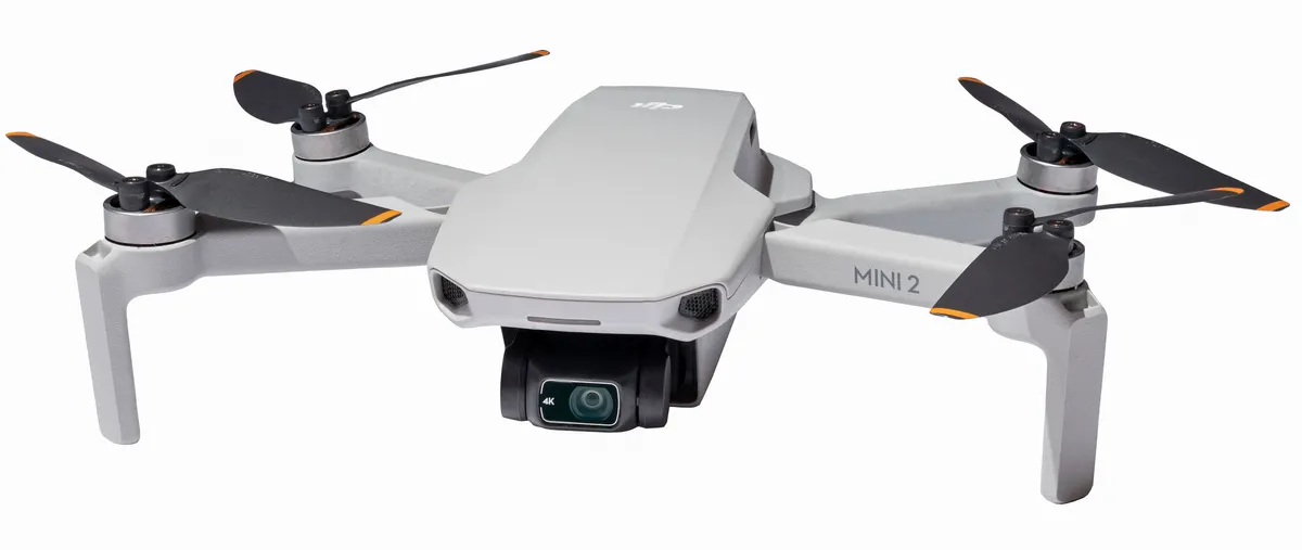 An earlier DJI Mini 2 drone shown for comparison with the Mini 4 Pro