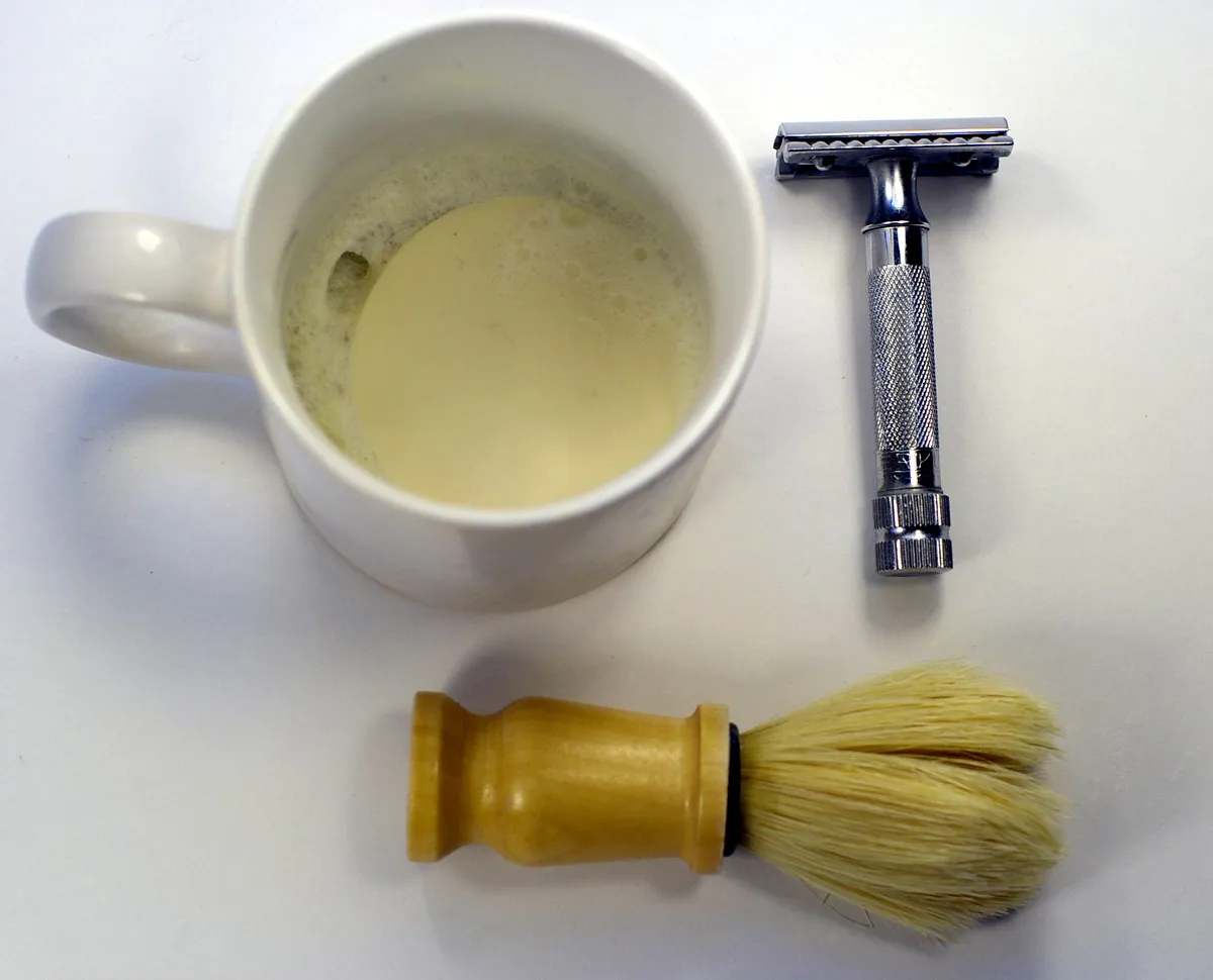 Safety razor shaving kit with brush, soap and stand