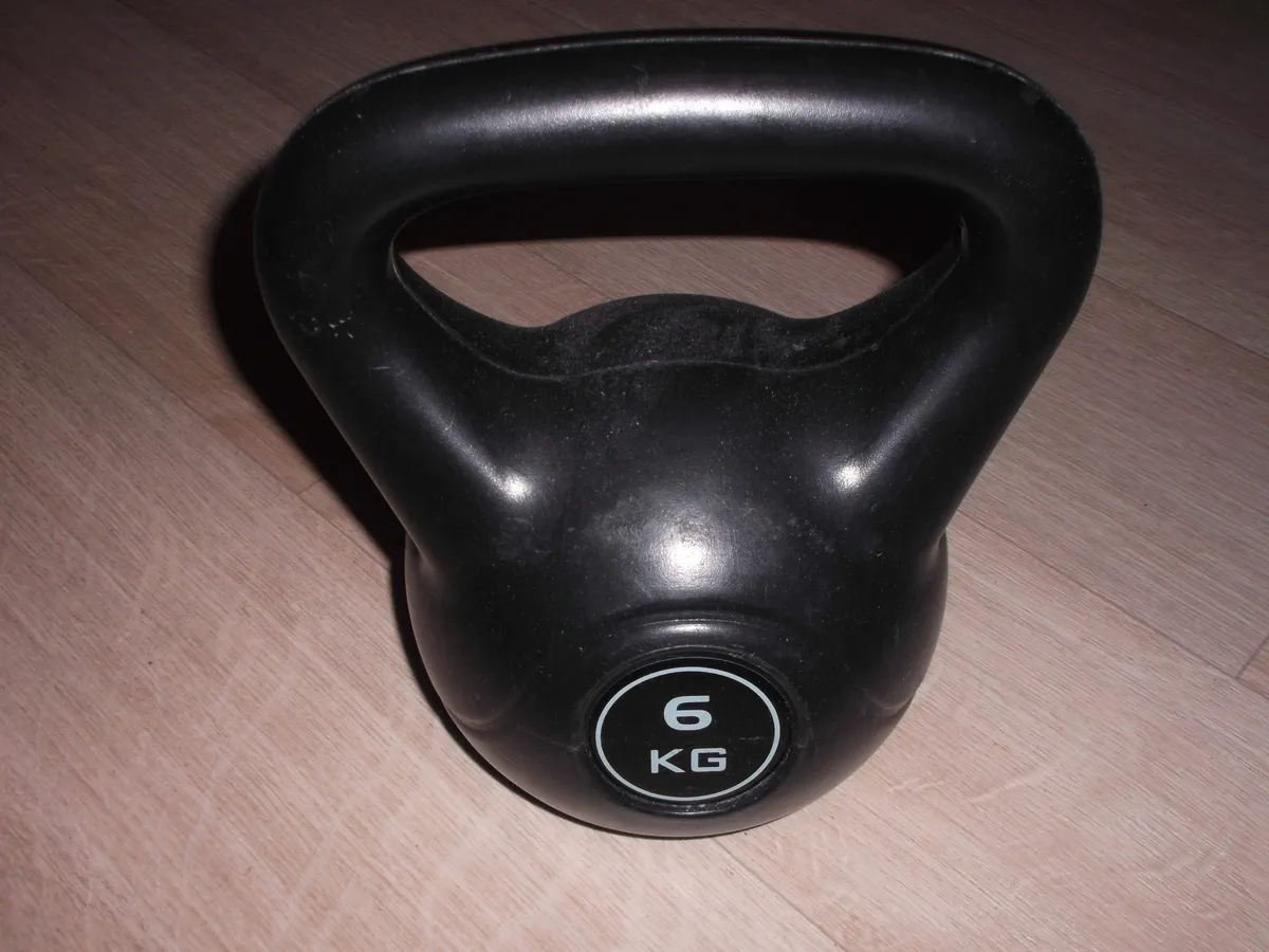A smaller fitness kettlebell showing the powder-coated finish