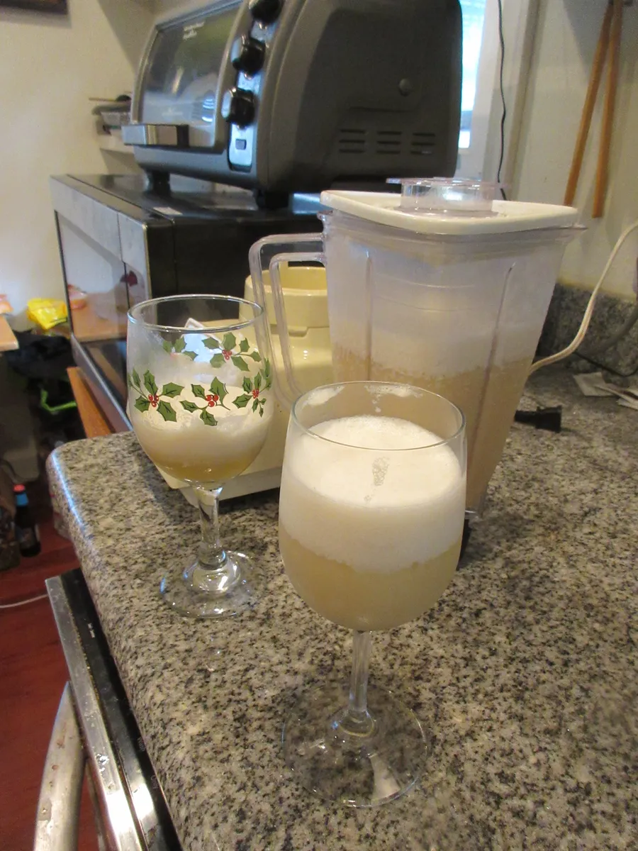 Blended drinks poured from a home kitchen blender
