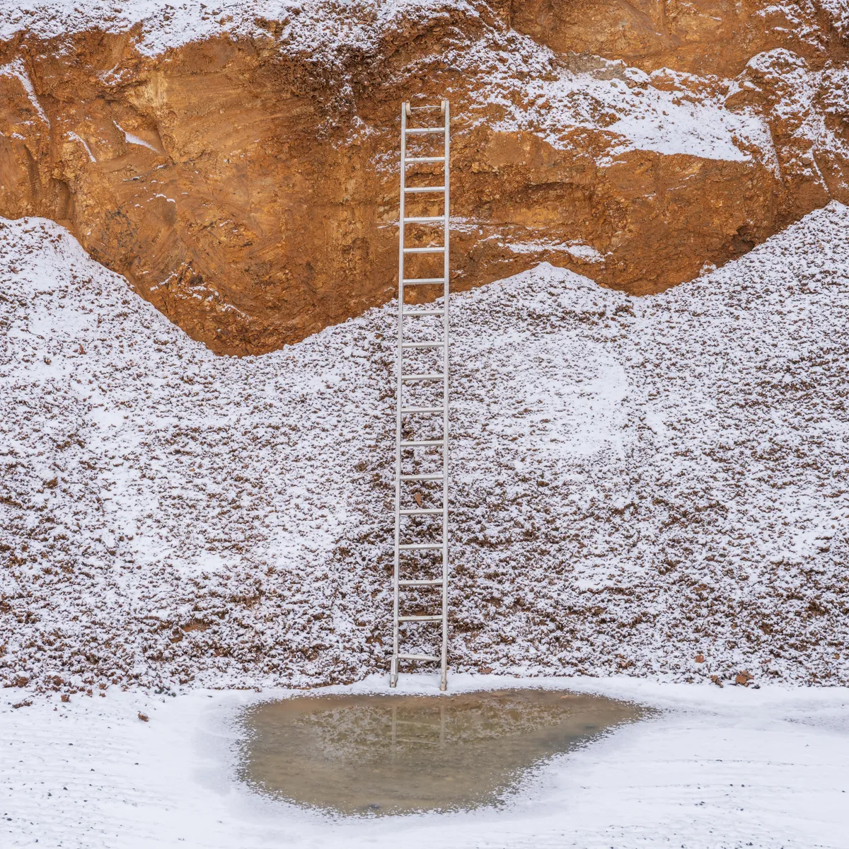 A ladder providing access into an excavation