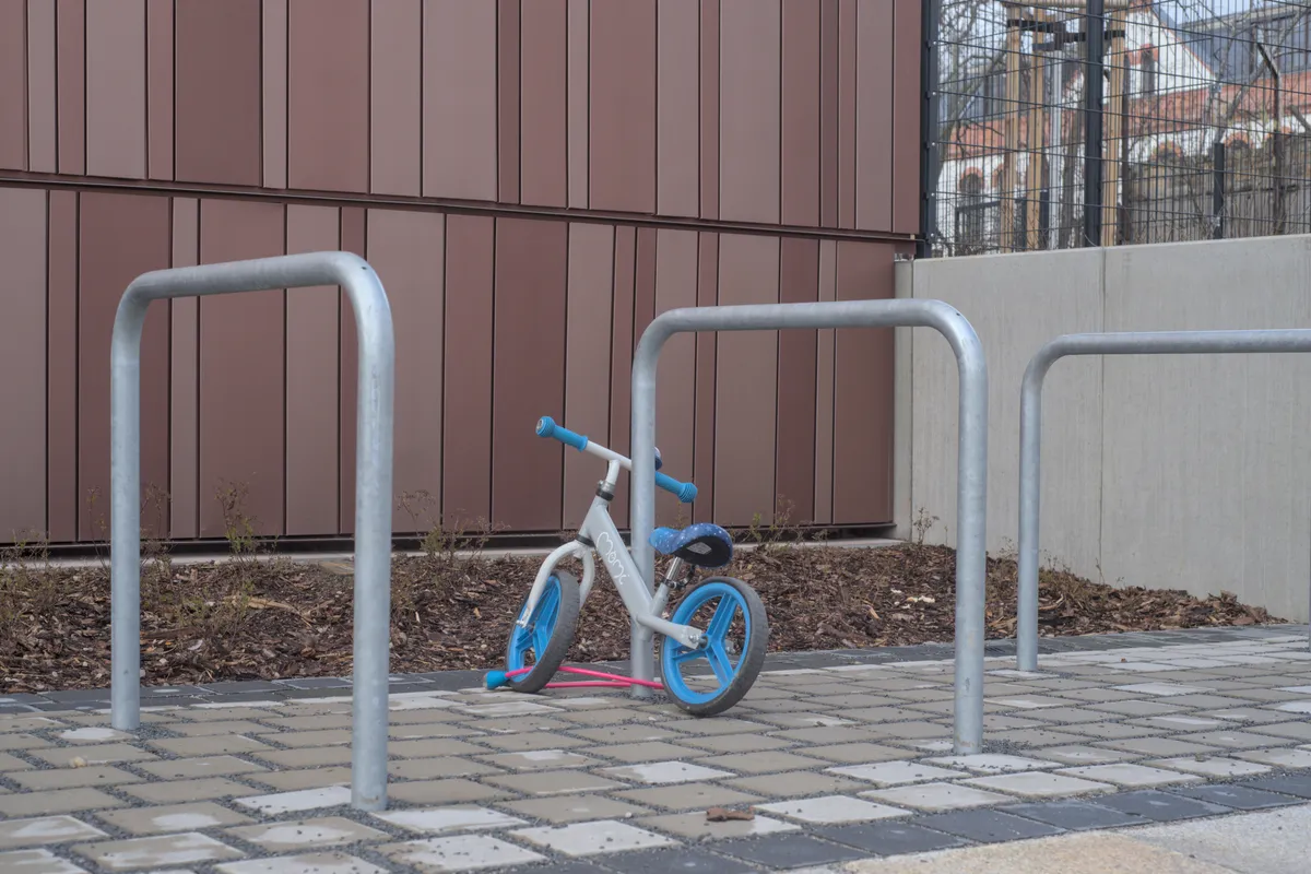 Children's balance bike parked outdoors