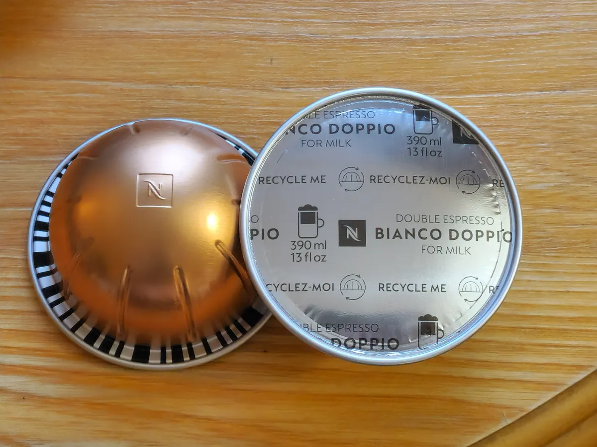 Two Nespresso Vertuo coffee capsule pods side by side